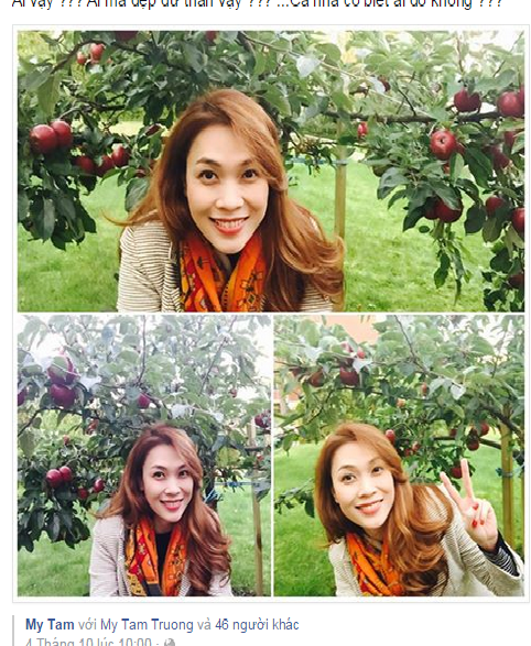 Mỹ Tâm chụp ảnh bên cây táo.