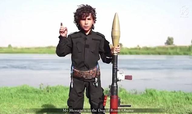 2D28BAAD00000578-0-Chilling_An_unnamed_child_jihadi_threatens_to_cut_off_US_Preside-a-27_1444907157652
