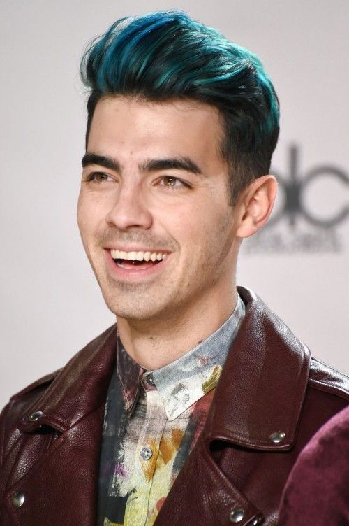 poses in the press room during the 2015 American Music Awards at Microsoft Theater on November 22, 2015 in Los Angeles, California.