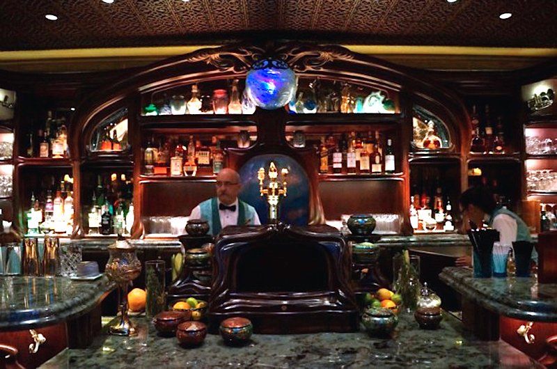 The wood in the ceiling and bar was designed to look as though it was carved by hand.