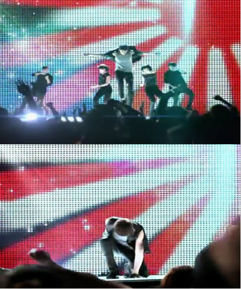 Hình cờ Nhật được chiếu trên màn hình trong buổi biểu diễn của 2PM.