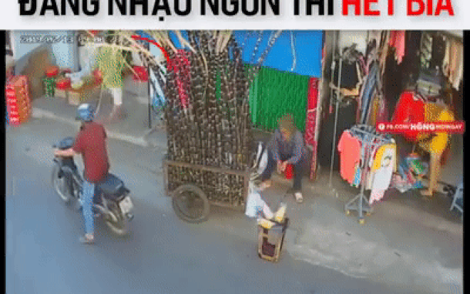Giữa 'thanh thiên bạch nhật', người đàn ông thản nhiên vào quán trộm thùng bia lên xe phóng mất hút Ảnh 2