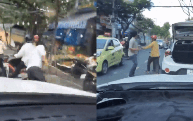 Clip: 2 người đàn ông cầm dao và cầm gậy lao vào ẩu đả, rượt đuổi nhau trên đường ở Đà Nẵng Ảnh 2