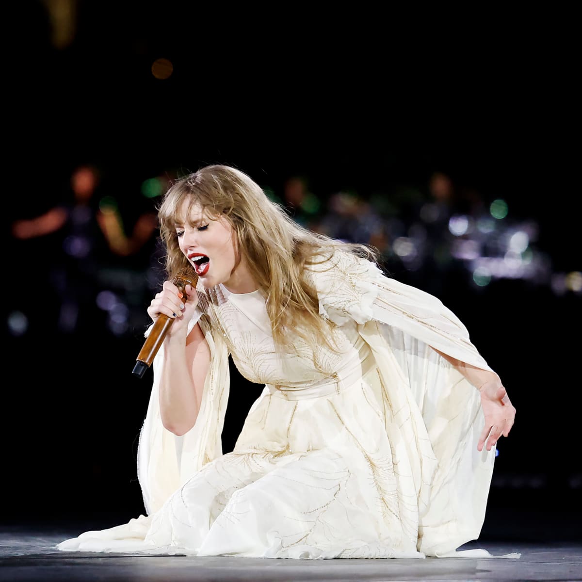 What does Taylor Swift do to ensure safety when performing in the UK after the show cancellation? Photo 2