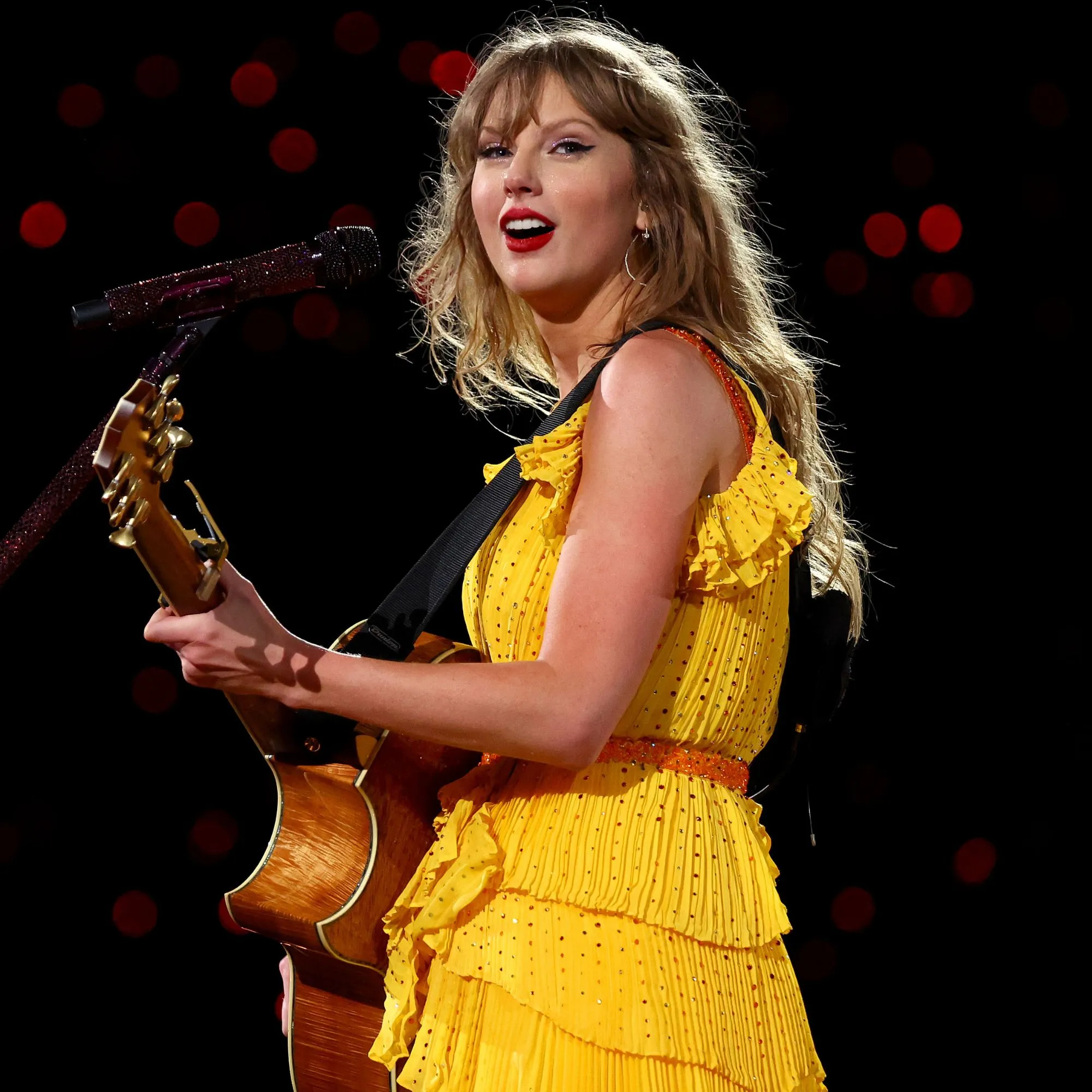 What does Taylor Swift do to ensure safety when performing in the UK after the show cancellation? Photo 1