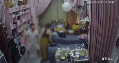 Camera an ninh ghi lại cảnh chị T. bị chồng cũ hành hung vào ngày 10/10. Ảnh cắt từ clip
