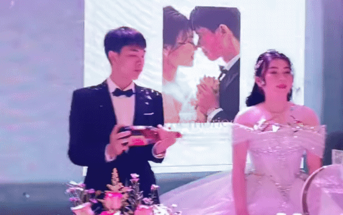 Clip: Chú rể lỡ làm đổ rượu vang lên váy cưới, cô dâu ứng xử nhận nhiều điểm 10 Ảnh 2