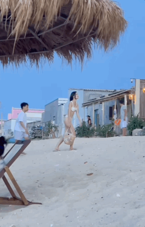 Bạn trai Ý Nhi nhận tranh cãi trái chiều vì không xách túi hộ 'nửa kia'. (Ảnh: Cắt từ clip) 