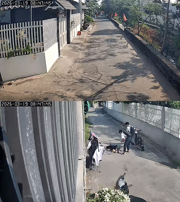 Hành động đẹp của 2 nam sinh được camera an ninh nhà dân ghi lại.