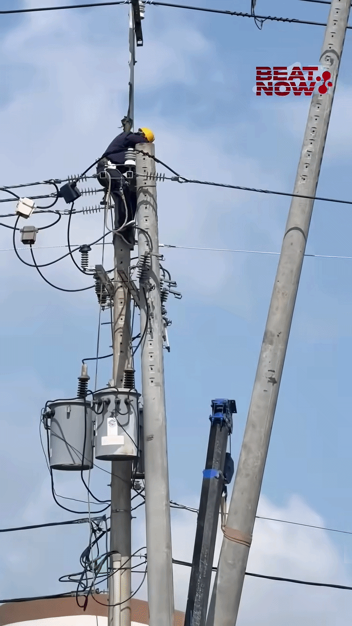 Thấy người thợ gục đầu trên cây cột điện, dân tình 'nín thở' theo dõi diễn biến và cái kết Ảnh 1