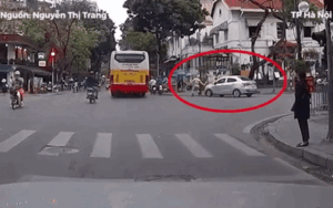 Clip: Không chấp hành hiệu lệnh, tài xế nhấn ga đẩy lùi CSGT rồi bỏ chạy