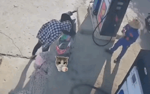 Đôi nam nữ vừa đến cây xăng, camera ghi lại khoảnh khắc làm ai cũng 'giật mình'