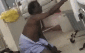 Xôn xao clip bệnh nhân Covid-19 lê lết trên sàn nhà, ngã xuống đất 40 phút cũng không ai đoái hoài