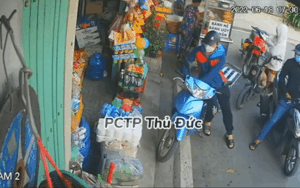 Clip: Vờ mua chai nước suối, 2 đối tượng thản nhiên bẻ khóa trộm xe máy trước mặt nhiều người