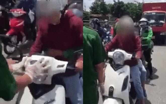 Người phụ nữ chở con trai cố chấp 'thông chốt', lớn tiếng chửi bới: 'Xê ra, đường của tôi tôi đi' Ảnh 2