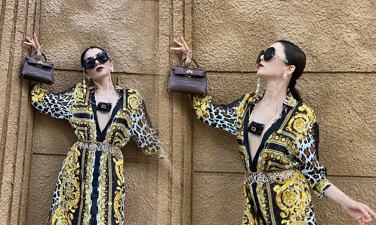 Lệ Quyên mặc váy xẻ sâu đến rốn, phô trương đồ hiệu lộ liễu khiến fan nhức mắt Ảnh 2