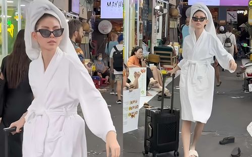 Nữ người mẫu Việt quấn khăn tắm ra đường gây xôn xao