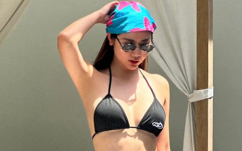 Huyền Lizzie diện bikini nhỏ xíu khoe vẻ đẹp căng tràn ở tuổi 34