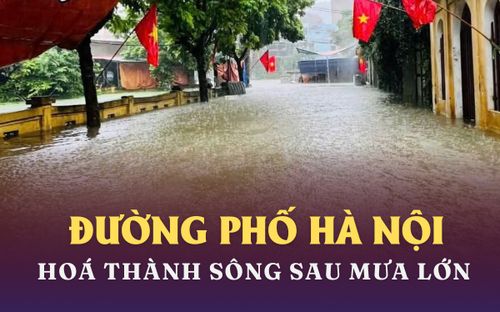 Đường ở Hà Nội hoá thành sông sau mưa lớn kéo dài