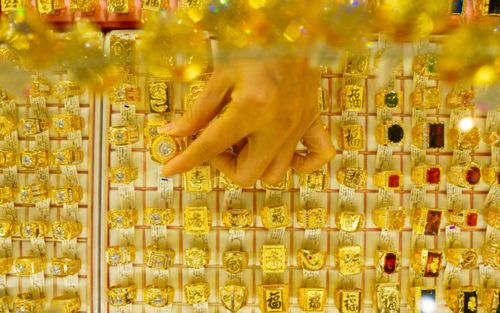 Tin tài chính hôm nay 2/3: Vàng và bạc biến động mạnh, USD giằng co