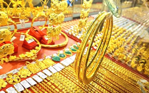 Tin tài chính hôm nay 22/3: Vàng và bạc lao dốc, USD duy trì đà tăng