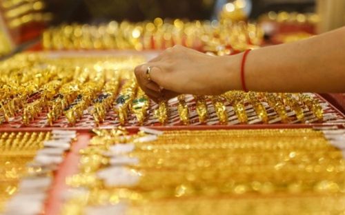 Tin tài chính hôm nay 14/4: Vàng bật tăng mạnh, USD ổn định