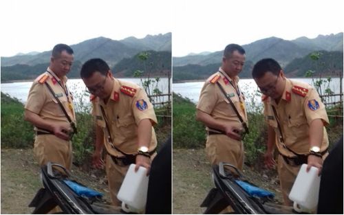 Chiến sĩ CSGT giúp đỡ cô gái dắt xe: 'Hôm ấy mưa lạnh, thấy cô gái nhỏ nhắn cố dắt xe nên chúng tôi giúp'