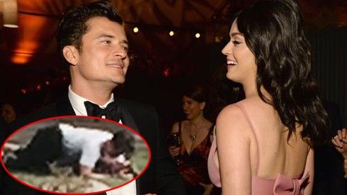 Orlando Bloom đè hôn cuồng nhiệt Katy Perry giữa bãi cỏ
