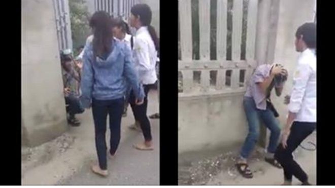 Chàng trai bị các nữ sinh cầm gậy đánh liên liếp trong tiếng cổ vũ của bạn bè