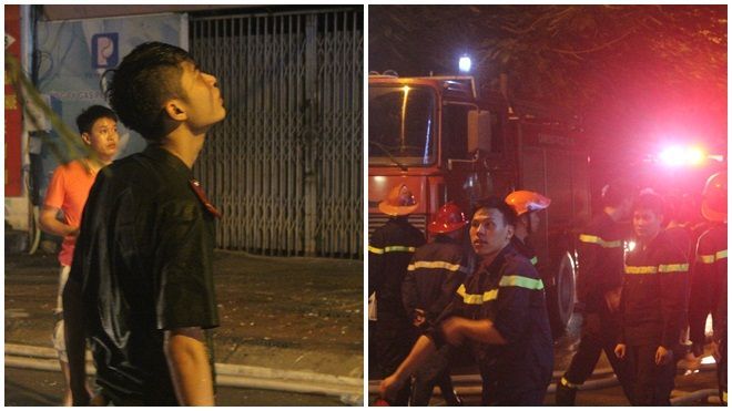 Lính cứu hỏa ướt sũng người dập tắt đám cháy phố Nguyễn Khang