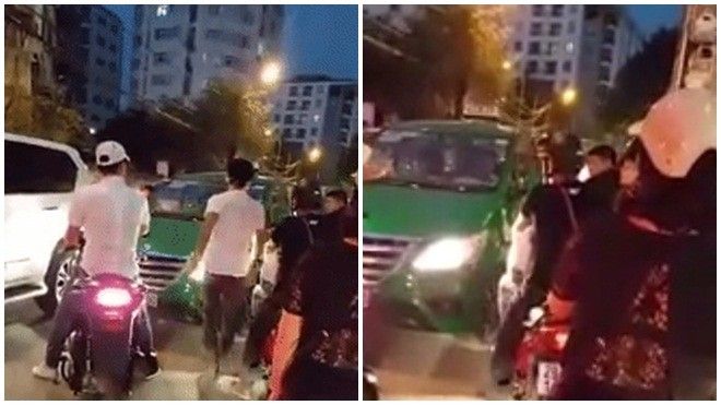 Clip: 2 thanh niên xăm trổ dọa tài xế taxi vì điều khiển xe lấn làn trong giờ cao điểm
