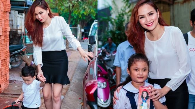 Diễm Hương đưa con trai đi trao quà Giáng sinh cho trẻ em