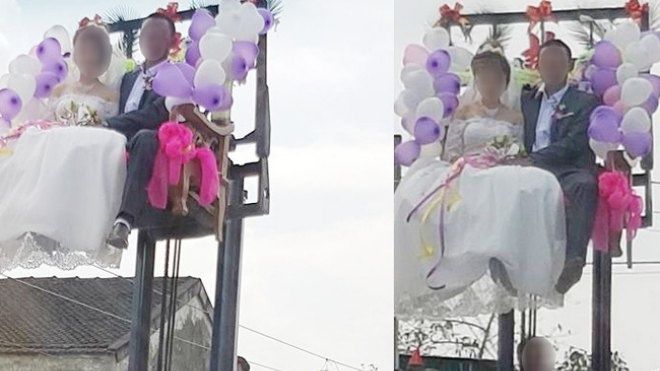 Đám cưới thót tim nhất Nghệ An: Cô dâu, chú rể ngồi vắt vẻo trên xe nâng cao quá mái nhà