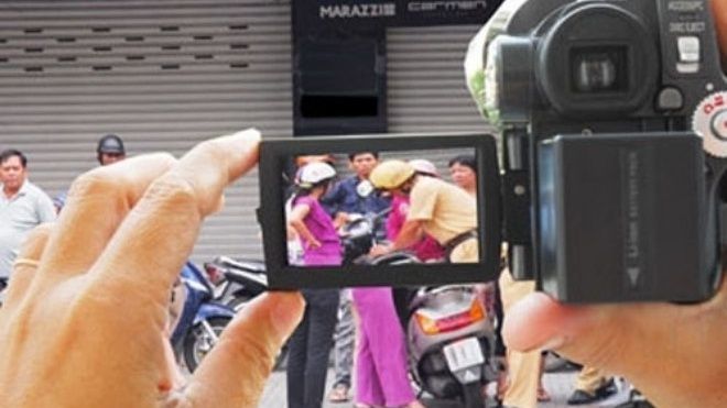 Không cấm nhà báo, người dân dùng thiết bị thông thường để quay phim, chụp ảnh
