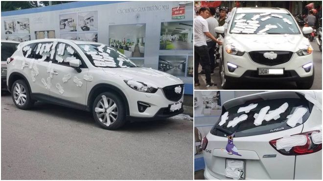 Hà Nội: Clip ô tô bị dán băng vệ sinh xung quanh vì đỗ sai chỗ