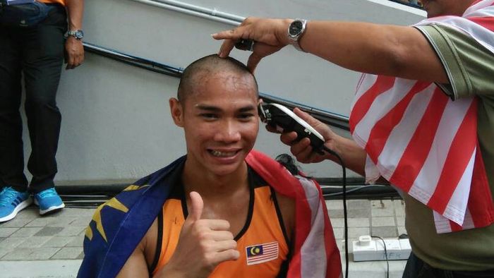 Câu chuyện cảm động đằng sau quả đầu “trọc lốc” của nhà vô địch SEA Games