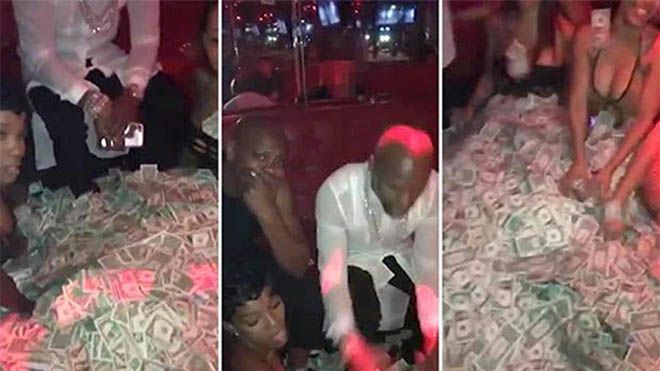 ‘Độc cô cầu bại’ Floyd Mayweather rải tiền trong hộp đêm thoát y