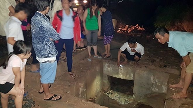 Bé trai 11 tuổi bị nước mưa cuốn vào cống mất tích