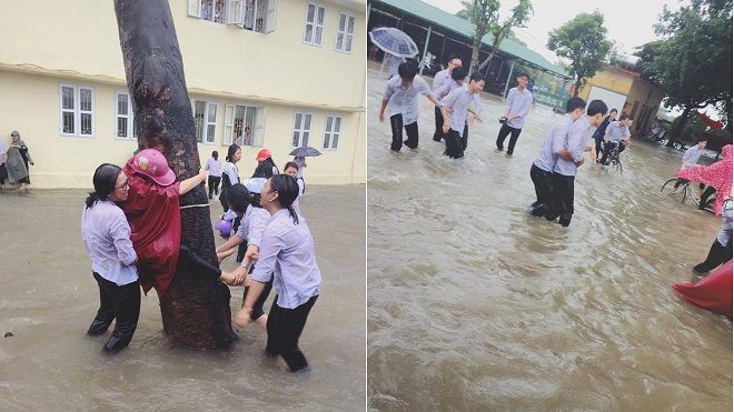 Học sinh đùa nghịch giữa sân trường trong ngày có 'Em gái mưa'