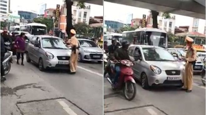 Lấy lý do bận việc, nữ tài xế quyết 'cố thủ' trên xe, nhấn ga đẩy CSGT đi xa 100m