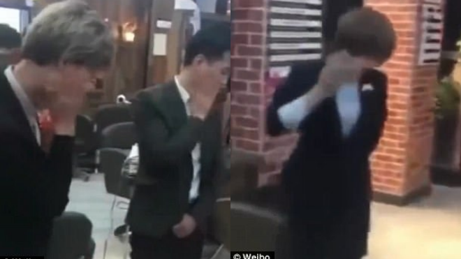 Sếp Trung Quốc bắt nhân viên tự vả bôm bốp vào mặt rồi quay video