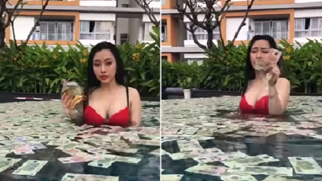 Bức xúc với 'hot girl xăm trổ làm từ thiện' tiếp tục tắm trong tiền và phát ngôn gây sốc