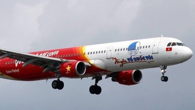 Chuyên cơ 'Tôi yêu Tổ quốc tôi' của Vietjet đón đội tuyển U23 Việt Nam về nước
