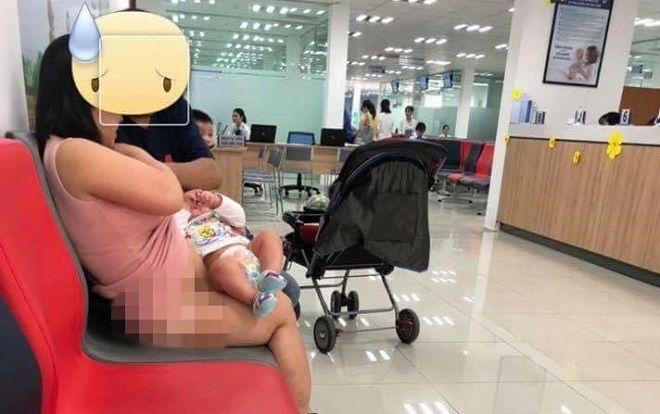 Tranh cãi cảnh bà mẹ trẻ kéo váy cho con bú ngay nơi công cộng, để lộ cả nội y