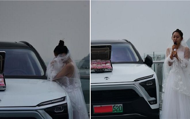 Cô gái mặc váy cưới, mang tiền và siêu xe lên cầu kính trên không để… thử thách người yêu mắc chứng sợ độ cao