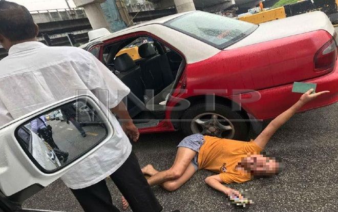 Người phụ nữ Việt nằm giữa đường cầu cứu cảnh sát Malaysia, chồng nói cô vợ bị tâm thần