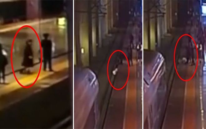 Nhảy xuống đường ray hòng dọa bạn trai, cô gái gặp phen hú vía khi tàu lao tới