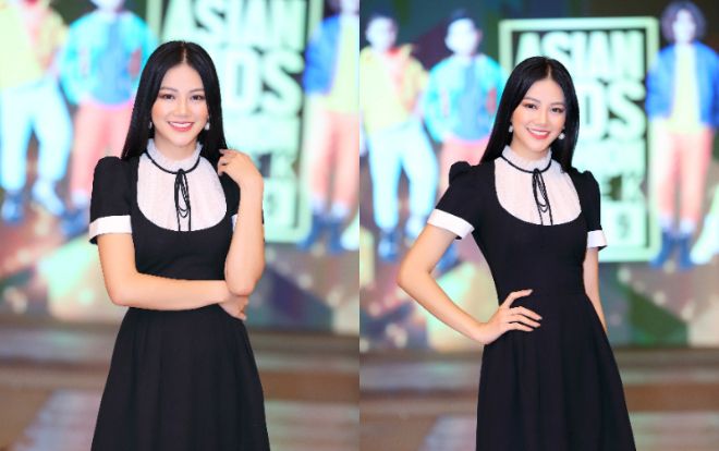 Hoa hậu Trái Đất Phương Khánh đáng yêu trong váy suông đen nô đùa bên dàn mẫu nhí