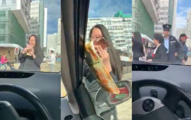 Tưởng làm việc tốt khi đứng phát tiền giữa đường, cô gái nhận ngay kết đắng