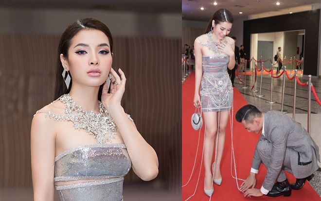 Bức hình ồn ào nhất tối qua: Phương Trinh Jolie được 'bạn trai tin đồn' cúi rạp người chỉnh váy
